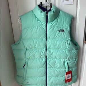 The North Face women’s XL Light Green Puffer Vest 700 down filled